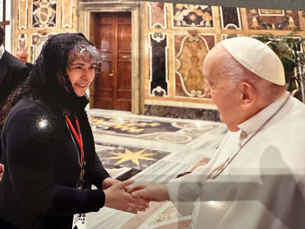 Melissa Miscevic Bramble, director of Operations at the Saint Kateri Tekakwitha Shrine and Historic Site greets Pope Francis at the Vatican.